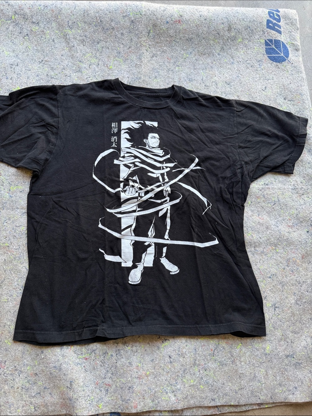 Black Short-Sleeve Graphic Tee with White Anime Illustration